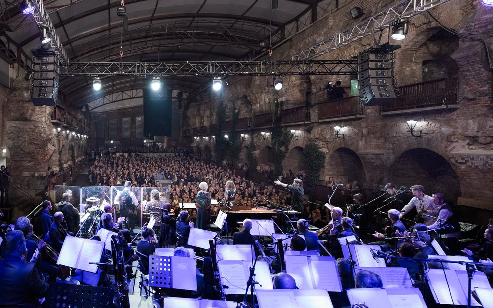 Balkan Symphonics - band and symphony orchestra on stage